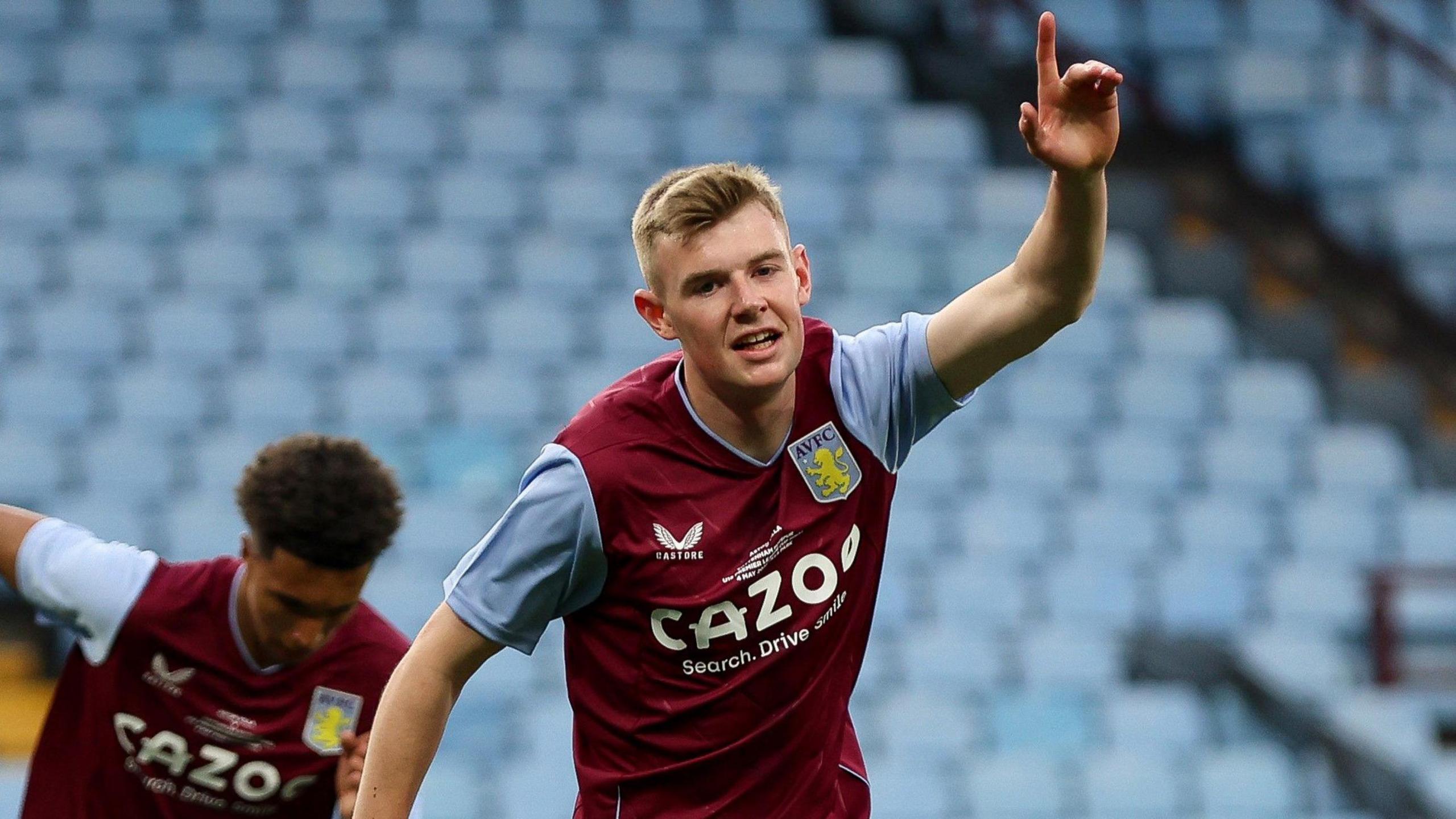 Rory Wilson celebrates scoring a goal