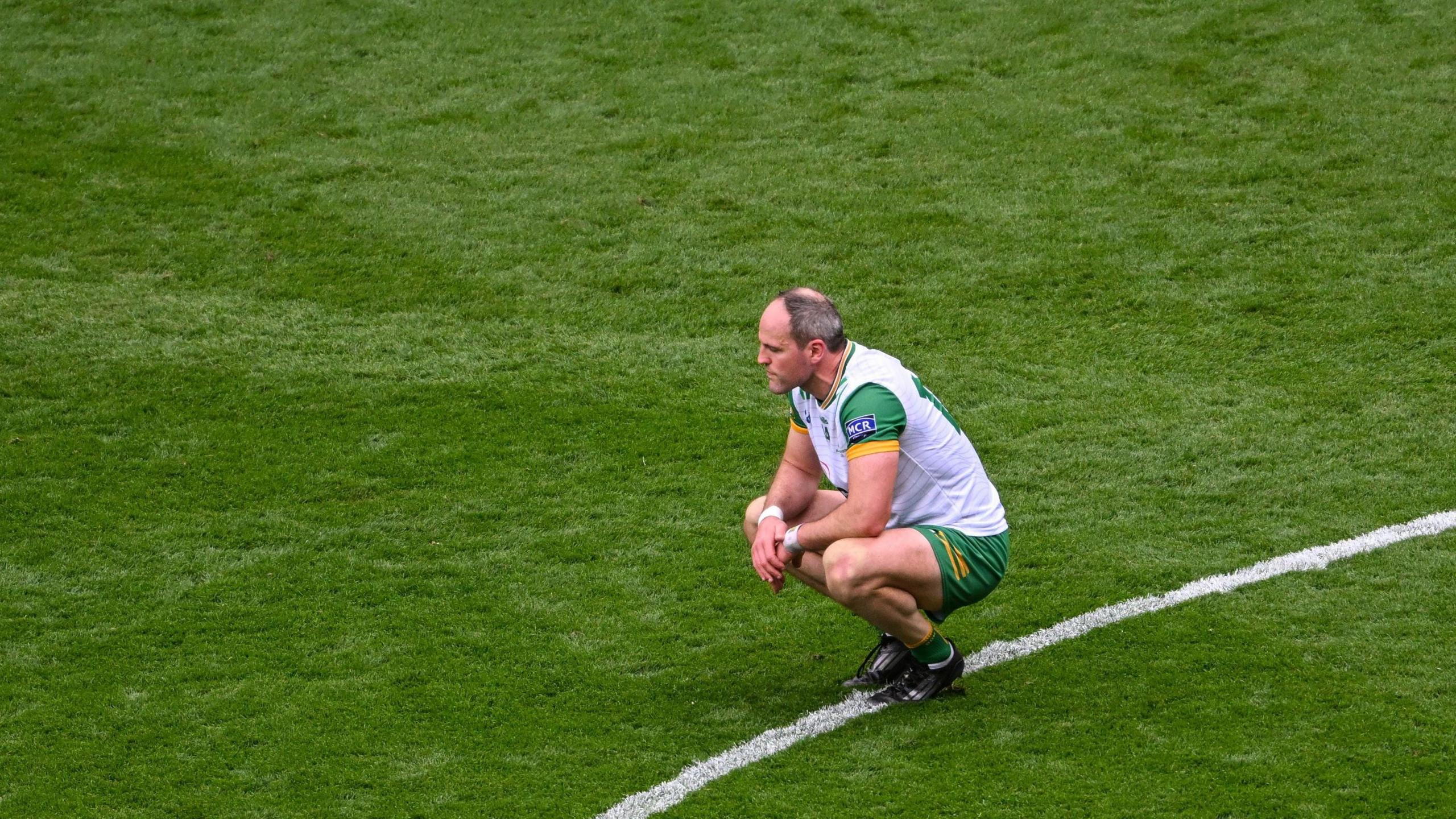Michael Murphy cuts a dejected figure on the pitch