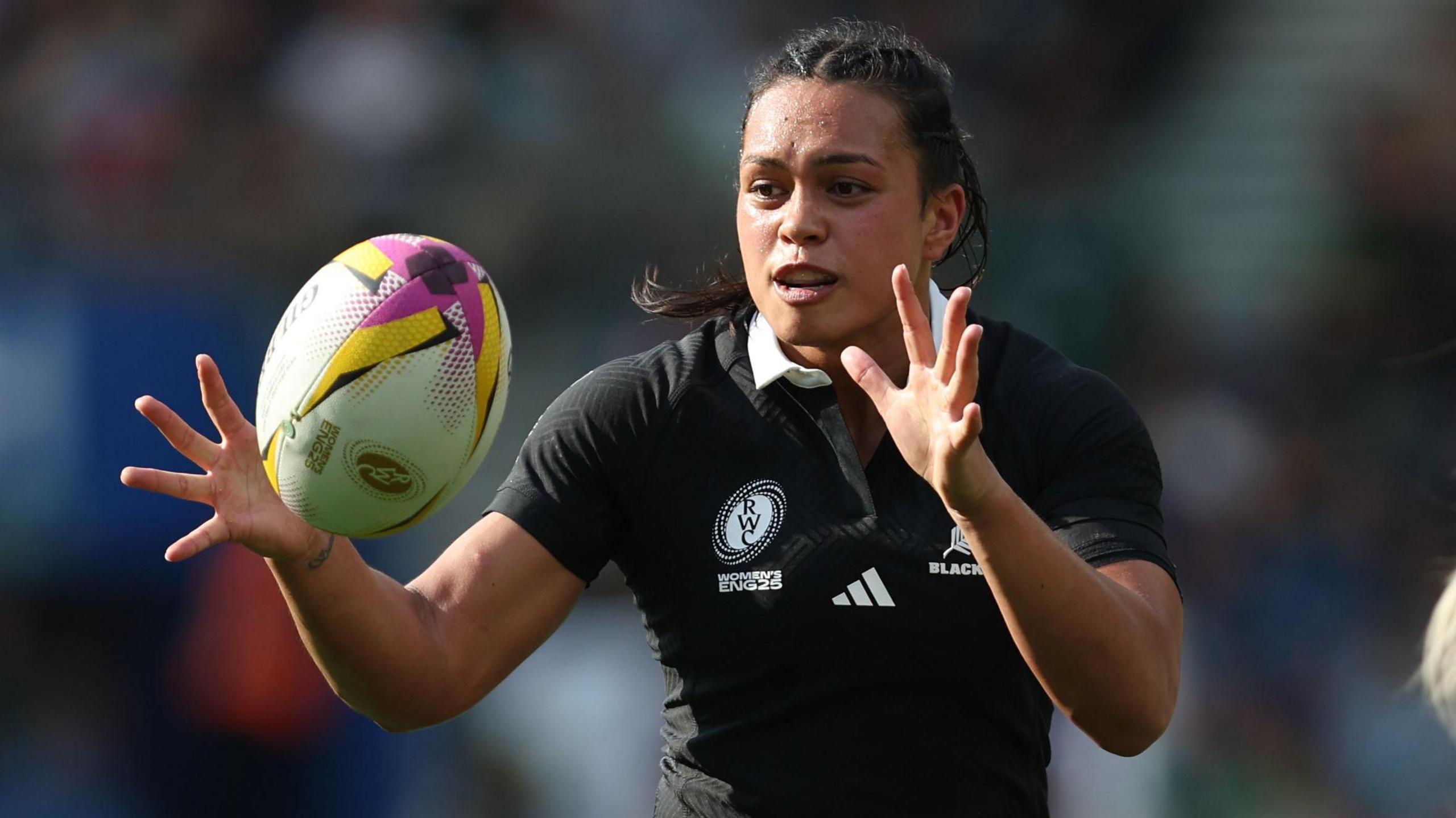 Layla Sae holds her hands out to catch a ball during a pre-match warm-up for New Zealand during the World Cup