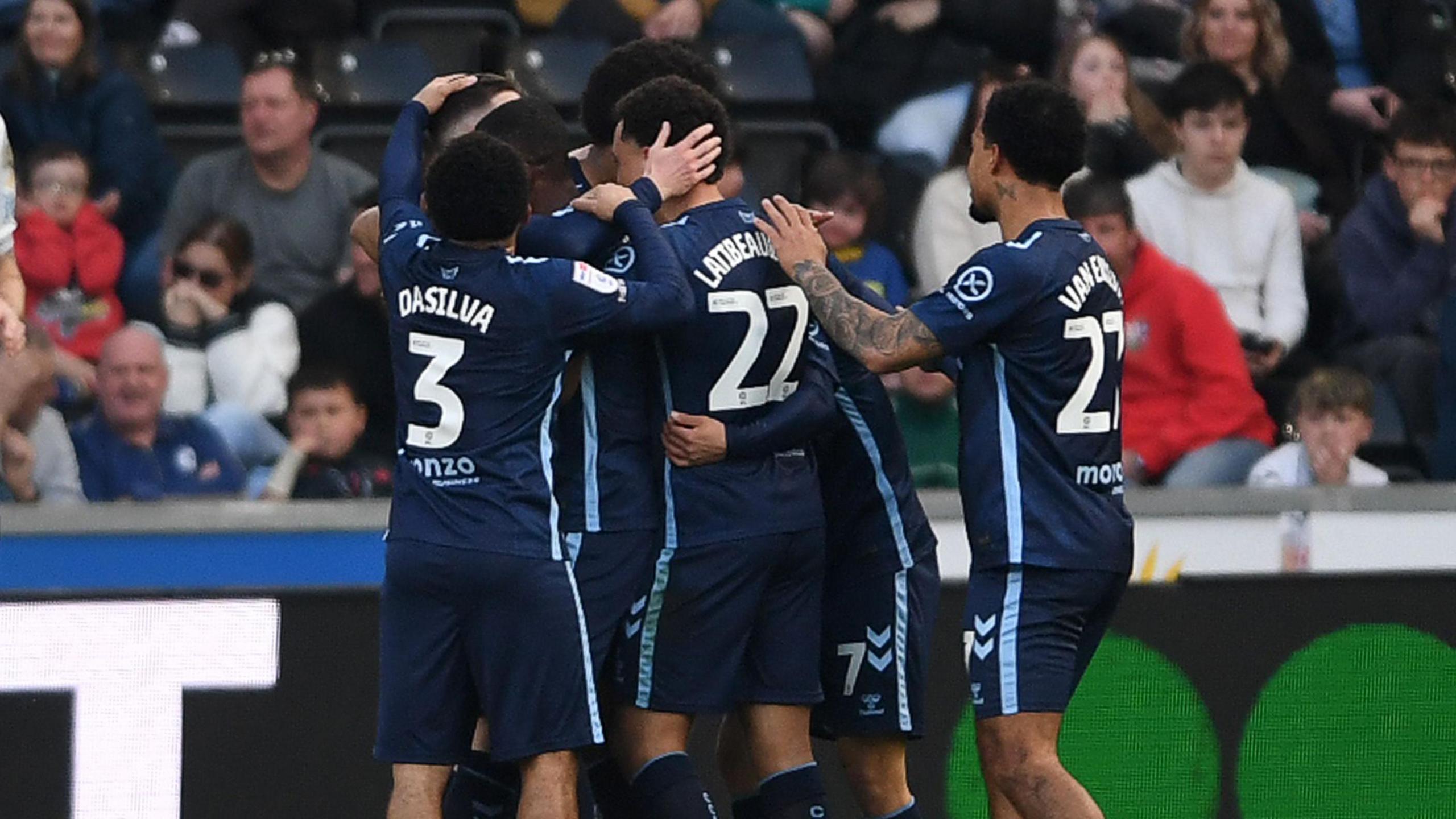 Coventry players celebrate taking the lead