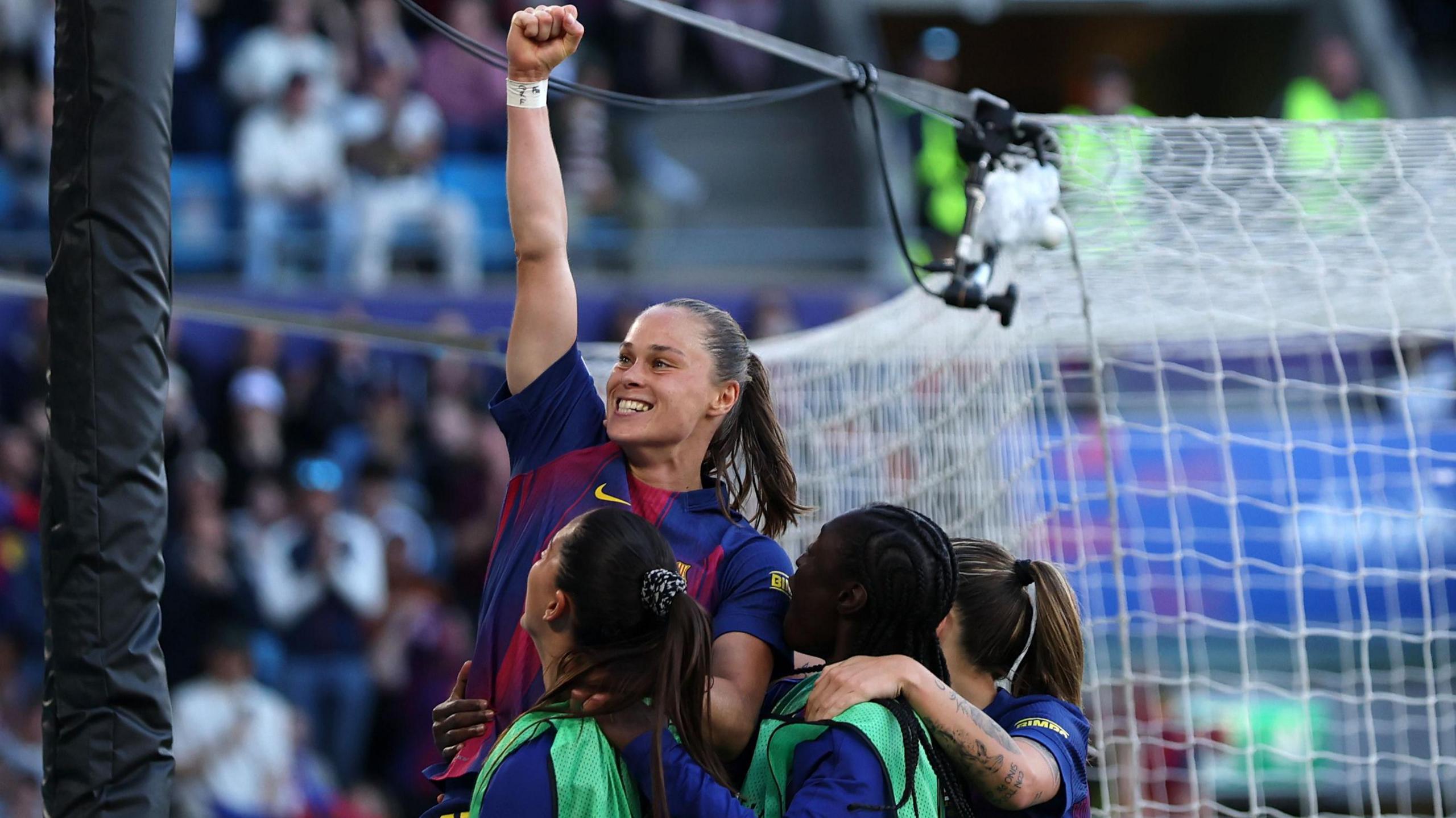 Ewa Pajor of FC Barcelona celebrates scoring her team's second goal with teammates