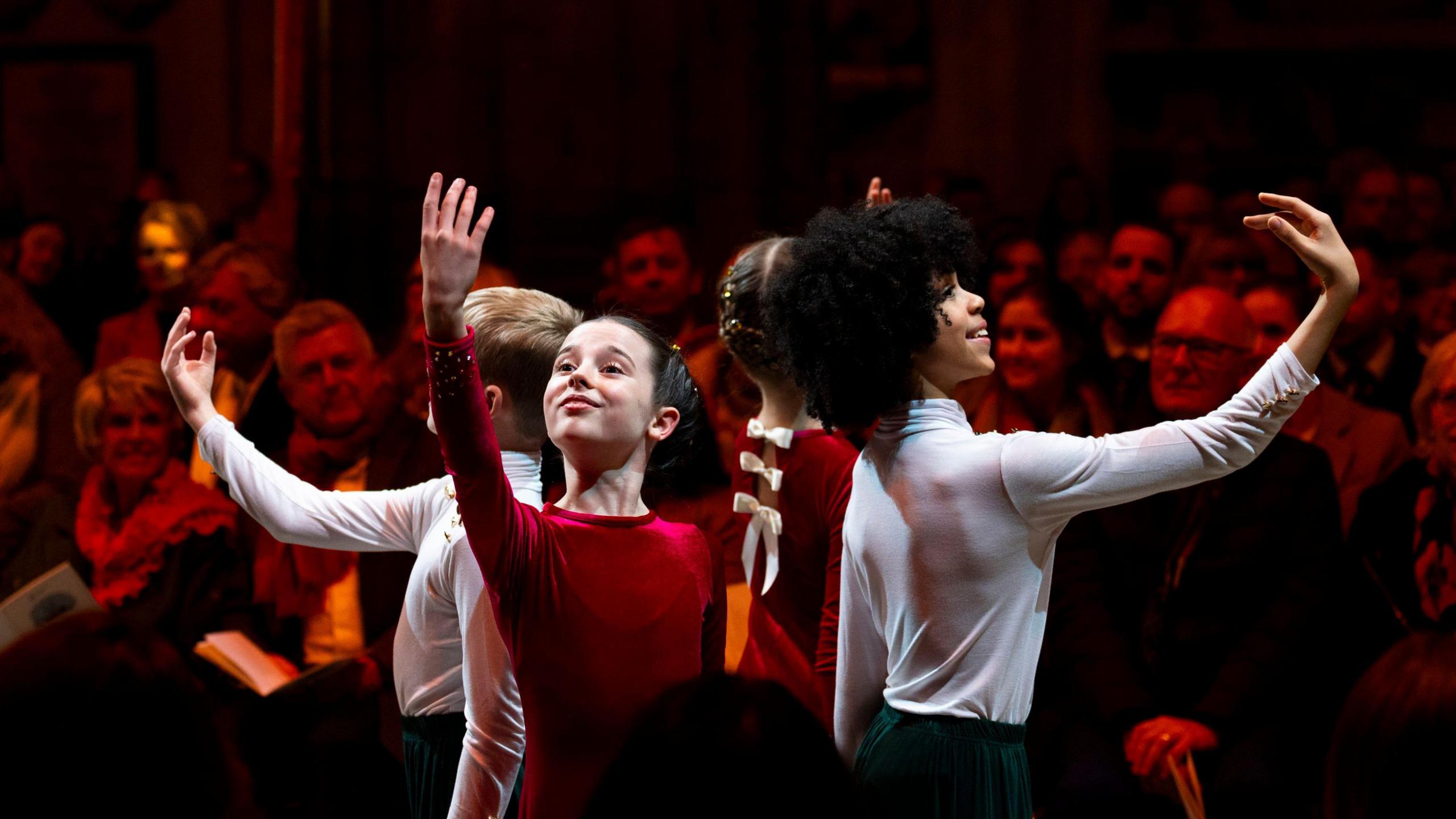 Four children perform a ballet routine at the Together at Christmas event