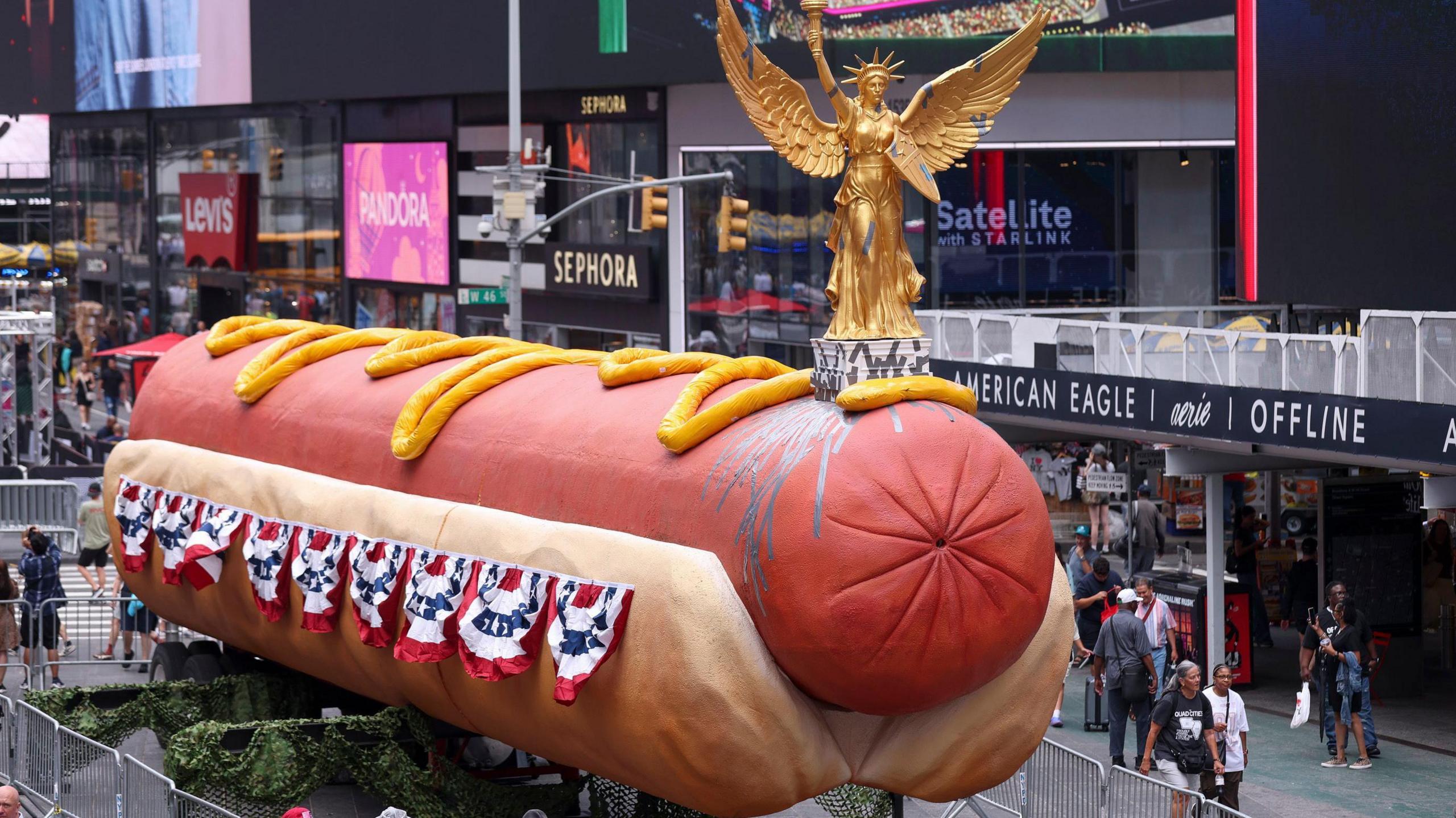 Giant hot dog sculpture in Times Square.