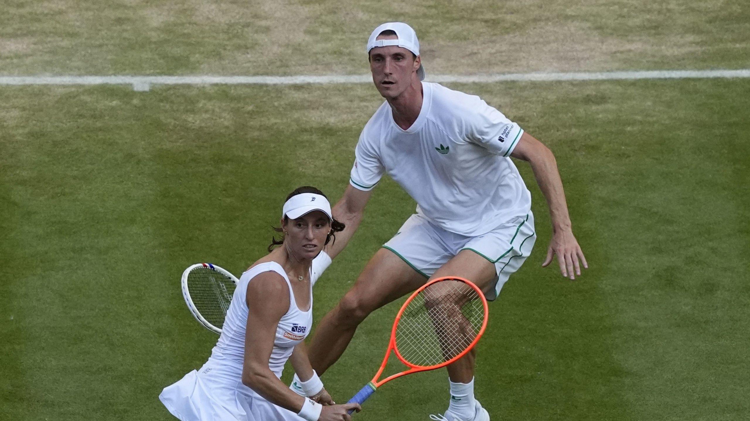Joe Salisbury and Luisa Stefani playing in the mixed doubles final at Wimbledon on Centre Court