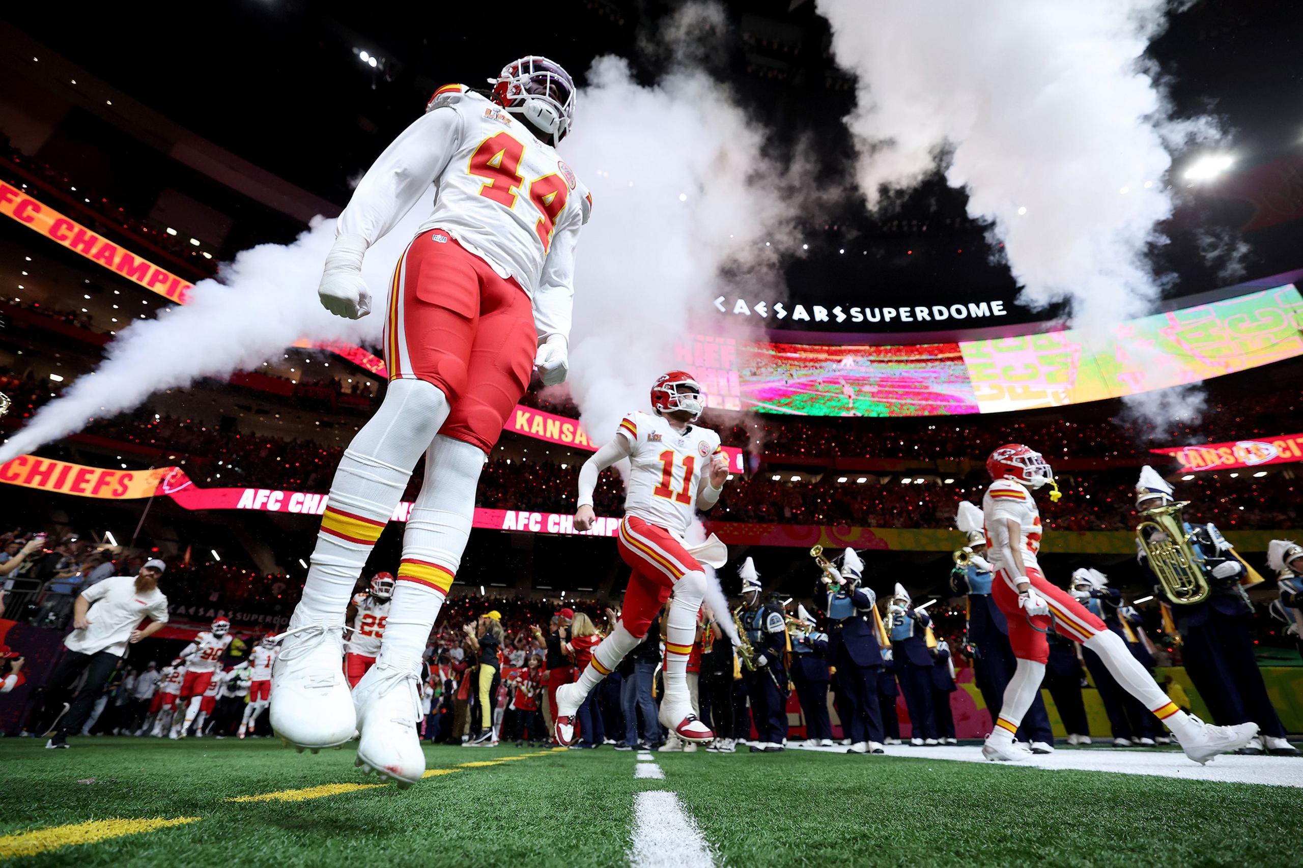 Travis Kelce and Patrick Mahomes of the Kansas City Chiefs take the field prior Super Bowl LIX against the Philadelphia Eagles at Caesars Superdome in New Orleans, Louisiana