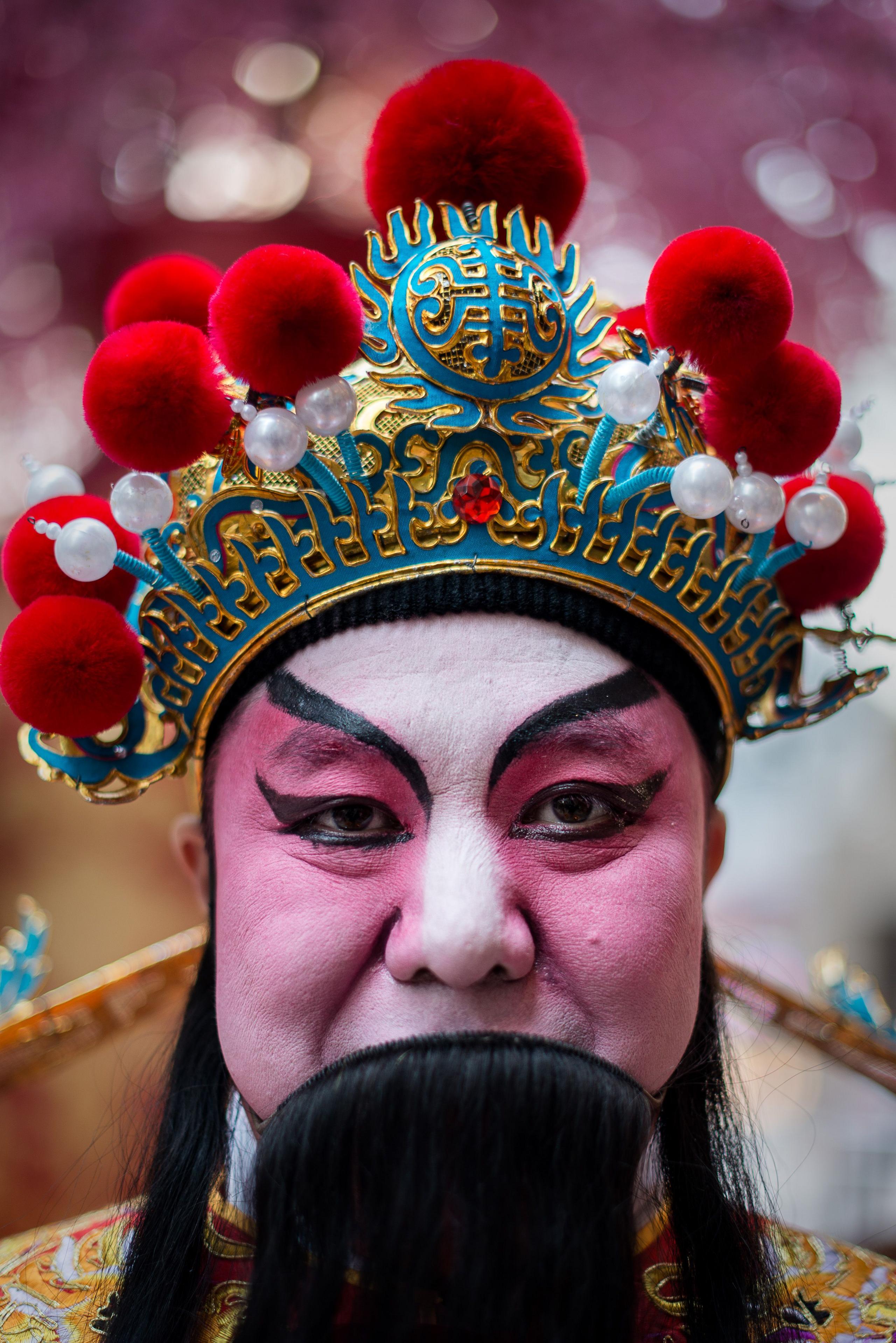 A performer wearing a traditional costume in China