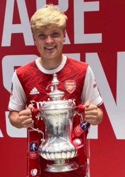 Arsenal's Matt Smith with the FA Cup trophy in 2020