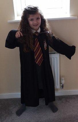 Five-year-old Esmé (age 5) went as Hermoine from Harry Potter this year. She loves reading with her mum.