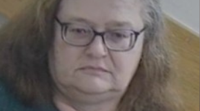 Sally Burborough looking at the camera. She is not smiling.