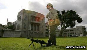 Soldier outside Fiji government buildings, December 2006