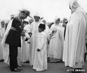 France's Resident-General decorates the future King Hassan II