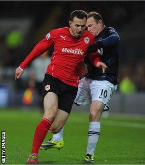 Wayne Rooney clashes with Jordan Mutch