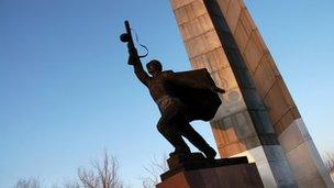 A statue of a soldier raising his gun aloft in the town of Kurchatov, Kazakhstan