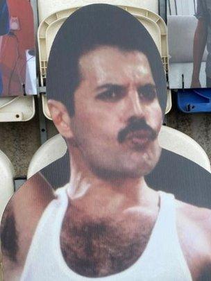 Cardboard cut-out of Freddie Mercury