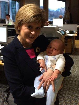 Nicola Sturgeon holding baby