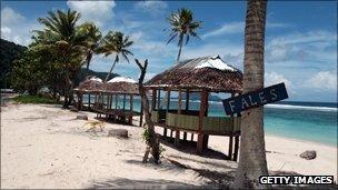 Fales on a beach in Samoa