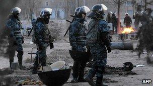 Riot police patrolling the Kazakh town of Zhanaozen following riots in December 2011