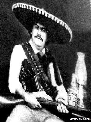 This photo shows Colombian drug kingpin and head of the Medellin Cartel Pablo Escobar posing as Mexican revolutionary Pancho Villa