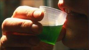 Man drinking methadone