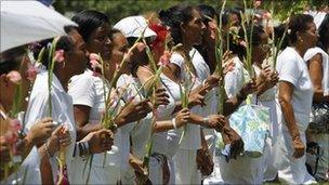 The Ladies in White kneel in prayer during their weekly protest. Photo: July 2010