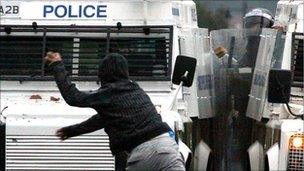 Rioter attacks police