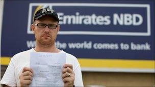 Nicholas Warner holding the police file against him (photo courtesy of Martin von den Driesch)