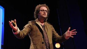 Chris Wild on stage at TED, (James Duncan Davidson)