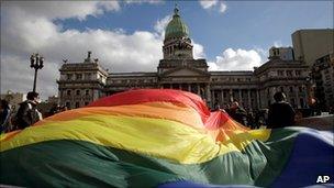 Demonstrators in favour of same-sex marriage demonstrate outside Congress on 14 July