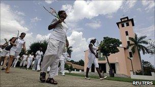 The Ladies in White, wives and relatives of jailed dissidents, seen marching on 4 July 2010