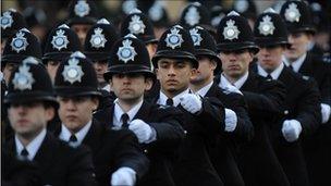 Newly qualified police officers at the Peel Centre in Hendon, north London take part in a passing out parade.