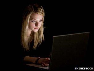 Girl staring at computer screen