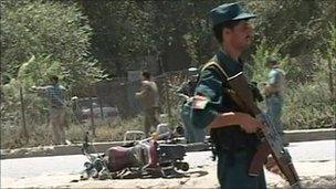 Police guarding suicide blast site, Kabul - 18 July 2010