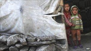 Afghan children at a camp for internally displaced people in Kabul 18 July 2010