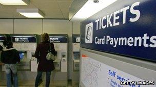 People buying tickets at Clapham Junction railway station