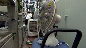 Fans cools down equipment at Earls Court Tube station