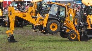 The JCB dancing diggers