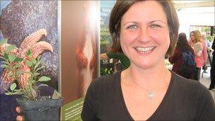 Dr Natasha deVere with a rare cotoneaster plant