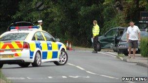 Police car at crash scene