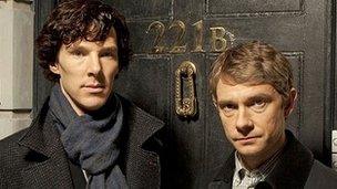 Benedict Cumberbatch (L) and Martin Freeman as Sherlock Holmes and Watson