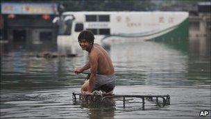 Man in flooded Wuhan, 23/07