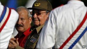 Raul Castro applauds during the Santa Clara rally