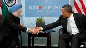 Indian Prime Minister Manmohan Singh shakes hands with US President Barack Obama at a G20 summit