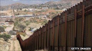 A fence separating the US state of Arizona and Mexico