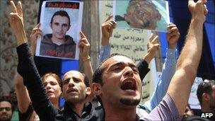 Egyptian political activist Ahmed Abu Doma shouting slogans during a protest in Cairo, 19 June