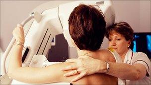 Patient undergoing mammogram