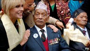 Joanna Lumley with Gurkhas outside the High Court