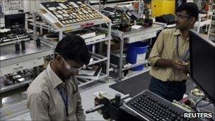 Indian workers at factory in Bangalore