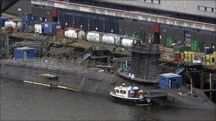 A trident submarine is pictured with a long lens at the Faslane naval base, Scotland, 14 March 2007