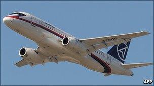 A Sukhoi Superjet 100 flies during an air display at the Farnborough International Airshow