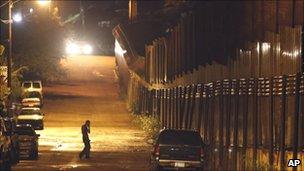 Man stands near the border with Mexico in Arizona